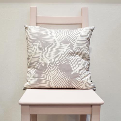 This stunning cotton linen cushion designed and made in England comes in a soft tropical pattern in grey for the perfect tropical addition to your home.